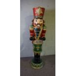 A large decorative Christmas Nutcracker drummer, shop display or Christmas Decoration, modern,