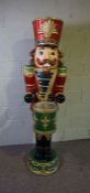 A large decorative Christmas Nutcracker drummer, shop display or Christmas Decoration, modern,