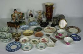 Assorted ceramics, including a Tramp on a Bench figure group, signed B. Merli; a Beswick figure of a