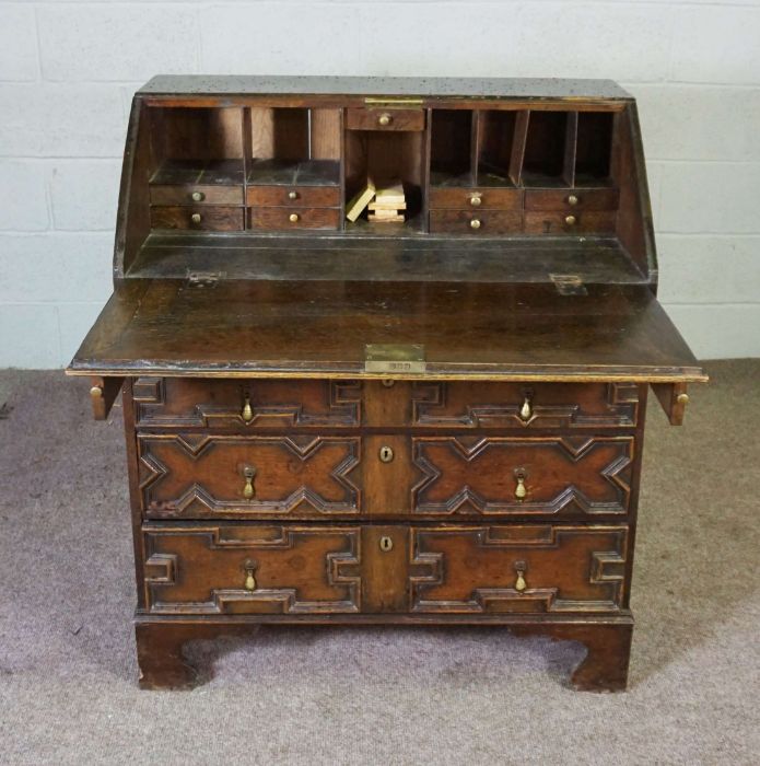 A Jacobean style oak bureau, 19th century revival, with a geometric moulded fall front, with boxwood - Image 4 of 6