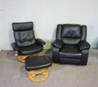 A modern bonded black leather reclining ‘lazy boy’ chair, together with another recliner chair and