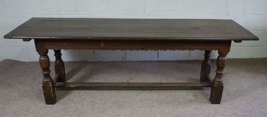 An oak Jacobean style refectory table, late 17th or 18th century, with a plain planked rectangular