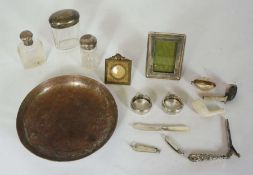 A white metal bowl, early 20th century, together with an assortment of objects including various