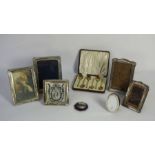 A group of six assorted silver and white metal mounted photograph frames, mainly early 20th century;