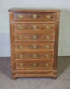 A Louis XVI style walnut chest of drawers, with a moulded top over six drawers, 120cm high, 80cm