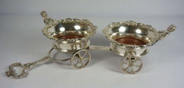 A silver plated George III style double wine coaster carriage, 20th century, each of the two