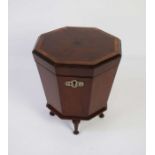 An unusual mahogany tea caddy, 19th century, in the form of a miniature George III style cellarette,