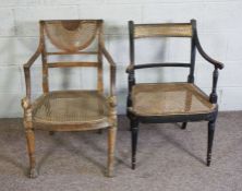 A George III oak and caned bergere armchair, circa 1800, with a scrolled over back, slender arms and