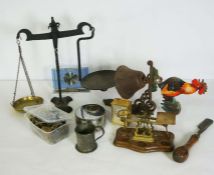 Box of assorted items, including a set of postal scales, a balance scale, mantel clock and other