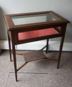Edwardian mahogany vitrine table, circa 1910, with glass inset top and decorative banding, the