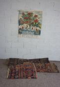 A small tribal tekke rug, 176 x 108cm; together with another rug, 183 x 142cm, a tribal remnant, 102