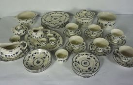 A Royal Doulton part dinner service, ‘Yorktown’ pattern, including a large oval serving dish,