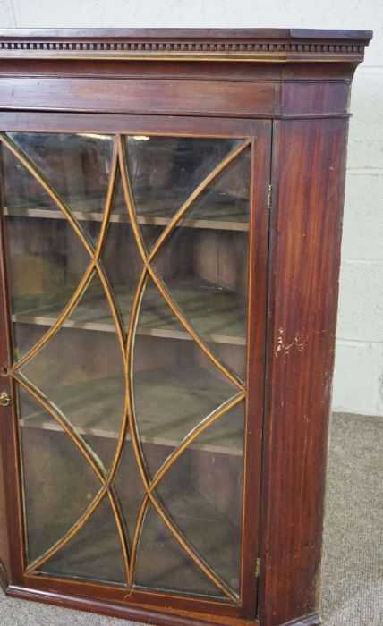 A George III mahogany corner cabinet, with a single glazed door and boxwood line inlays, 105cm high, - Image 4 of 5