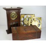 Assorted clock parts, including a brass longcase dial sectio, signed Mayor Scholfield, Rochdale,