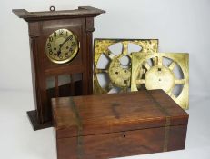 Assorted clock parts, including a brass longcase dial sectio, signed Mayor Scholfield, Rochdale,