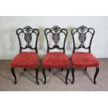 Three Victorian style stained wood salon chairs, with ‘pineapple’ pierced backs and stuffed over