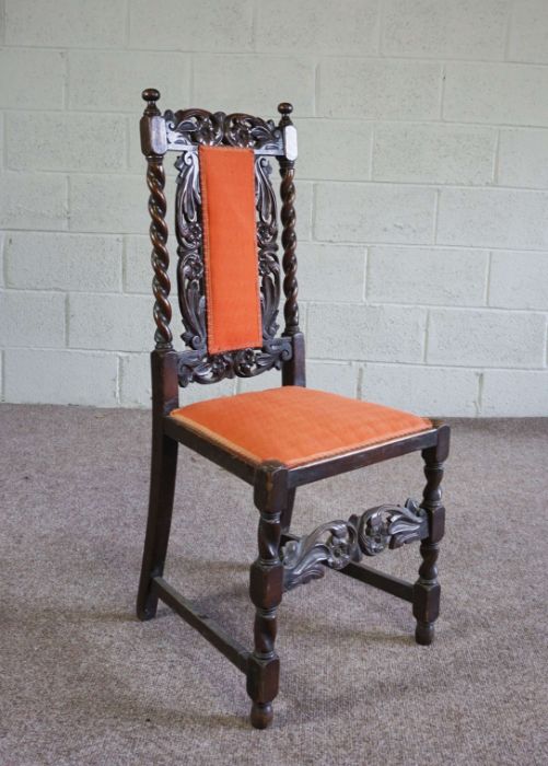 A set of eight Jacobean style oak framed dining chairs, circa 1900, each with a carved crest rail, - Image 4 of 5