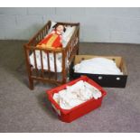 A child’s cot, mid 20th century, with slatted and folding sides, including a small mattress (used as