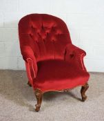 A Victorian walnut framed and button upholstered bedroom chair, late 19th century, with a padded and