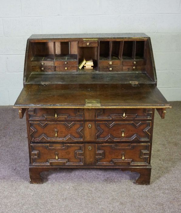 A Jacobean style oak bureau, 19th century revival, with a geometric moulded fall front, with boxwood - Image 3 of 6