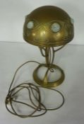 An Art Nouveau style brass table lamp, with opaque cabochons and brass shade, 43cm high Condition