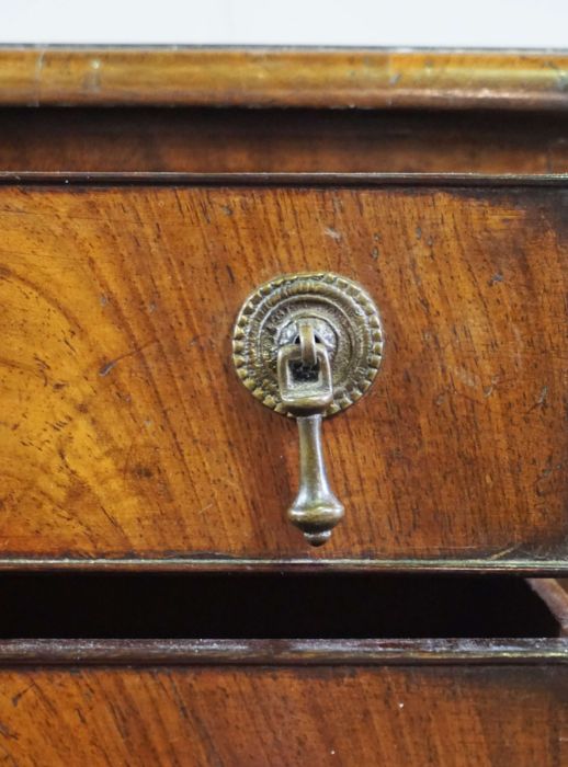 A rotating oak bookstand, circa 1900, with square moulded top, four book compartments with - Image 4 of 4