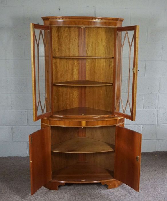 A modern yew wood veneered bow front corner cabinet, floor standing, 181cm high. 82cm wide - Image 2 of 3