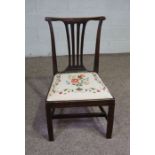 A provincial George III style dining chair, 19th century, with pierced splat, drop in floral