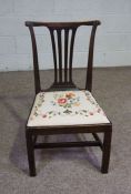 A provincial George III style dining chair, 19th century, with pierced splat, drop in floral