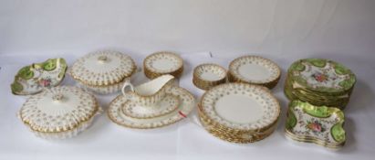 A Spode bone china part dinner service, ‘Fleur de Lys Gold’ pattern, 20th century, including two