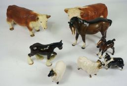 A group of Beswick figures, including a Blackface tup and ewe, (9cm high); a Mare and foal, (16.