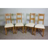 A small modern oak draw leaf dining table and four matched dining chairs (5) (Sold in aid of