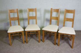 A small modern oak draw leaf dining table and four matched dining chairs (5) (Sold in aid of