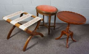 A small French style dressing stool, a reproduction yew veneered side table and a folding luggage