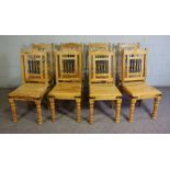 A set of eight Continental dining chairs, probably olive wood, Modern, each with inset ‘ironwork’