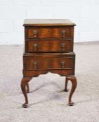 A small Queen Anne style walnut chest of three drawers, 20th century, with a mounded top over two