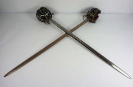 A pair of Regimental Scottish basket hilt swords, 18th century pattern, but probably early 20th