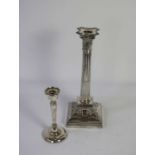 A silver candlestick, in the form of a Corinthian column, hallmarked Sheffield, 1898, James