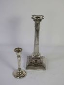 A silver candlestick, in the form of a Corinthian column, hallmarked Sheffield, 1898, James