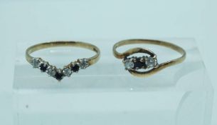 A 9 carat gold engagement ring and matching eternity ring, in white and black cubic zirconia, hooped