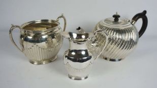 A Victorian silver teapot, hallmarked Sheffield 1892, James Dixon & Sons, of bullet form with