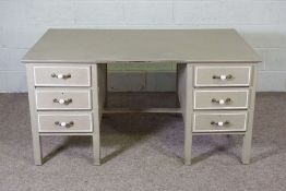 A modern writing desk, 20th century, with grey painted surface, the rectangular top over a six short