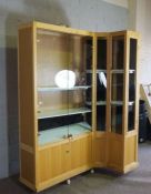 A large ash wood jewellers shop corner display unit, with adjustable shelving, 198cm high, 152cm