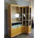 A large ash wood jewellers shop corner display unit, with adjustable shelving, 198cm high, 152cm