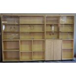 A large modern jewellery shop display cabinet, in sections, with a glazed top and lockable cabinets,