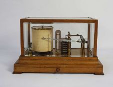 An oak cased barograph, unsigned, 21cm high, 21cm deep, 35cm long