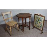 A tapestry firescreen; together with a small occasional table and a provincial kitchen chair (3)