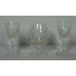 Assorted items including a box of Edinburgh Crystal table glasses (26), two carved figures of