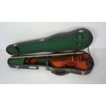 A cased violin and bow, labelled, Republic of China; together with another unmarked violin and