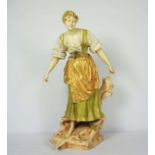 A large Royal Dux figure of a country lady, stamped to base indistinctly (possibly 9055), 62cm